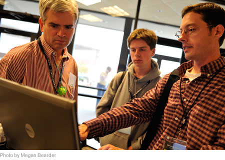 A Wolfram employee working with conference attendees during break